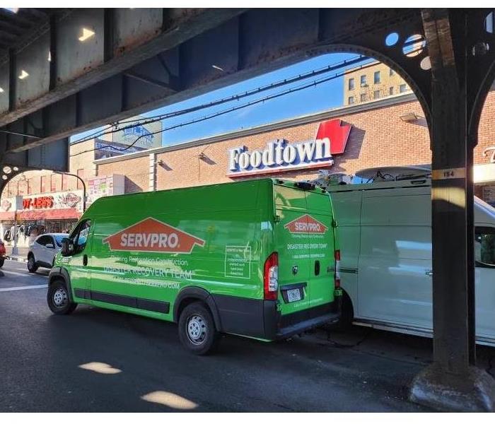 Green SERVPRO truck outside grocery store Foodtown of Riverdale